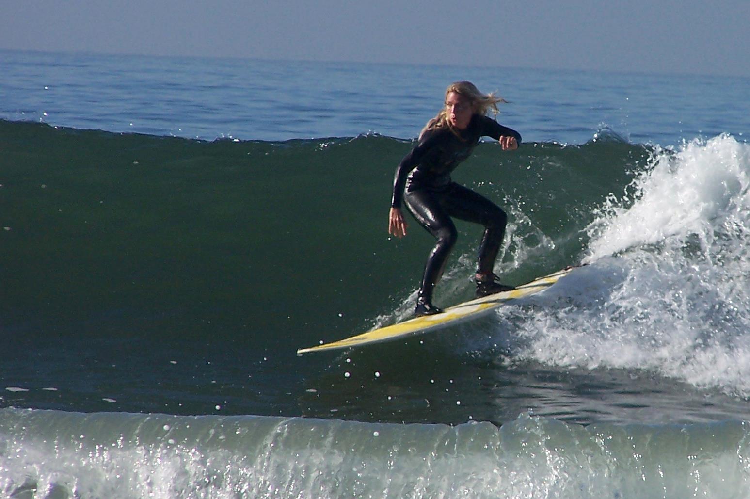 Jennifer Faith surfs with Jesus.