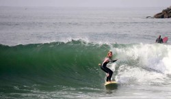 Two Paths: Having escaped a life of abuse to begin living the abundant life that Jesus promised his followers, Jennifer Faith surfing in southern California